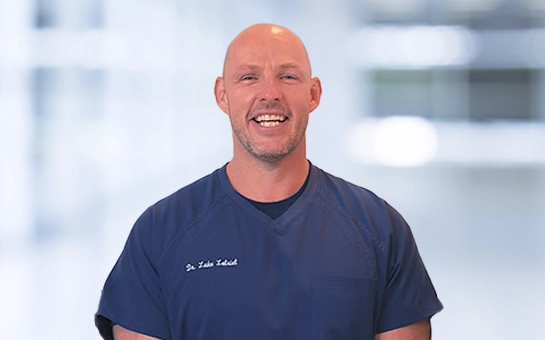 Dr. Luke Lotriet smiling, looking professional