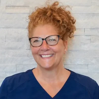 Headshot of the massage therapist, Maria
